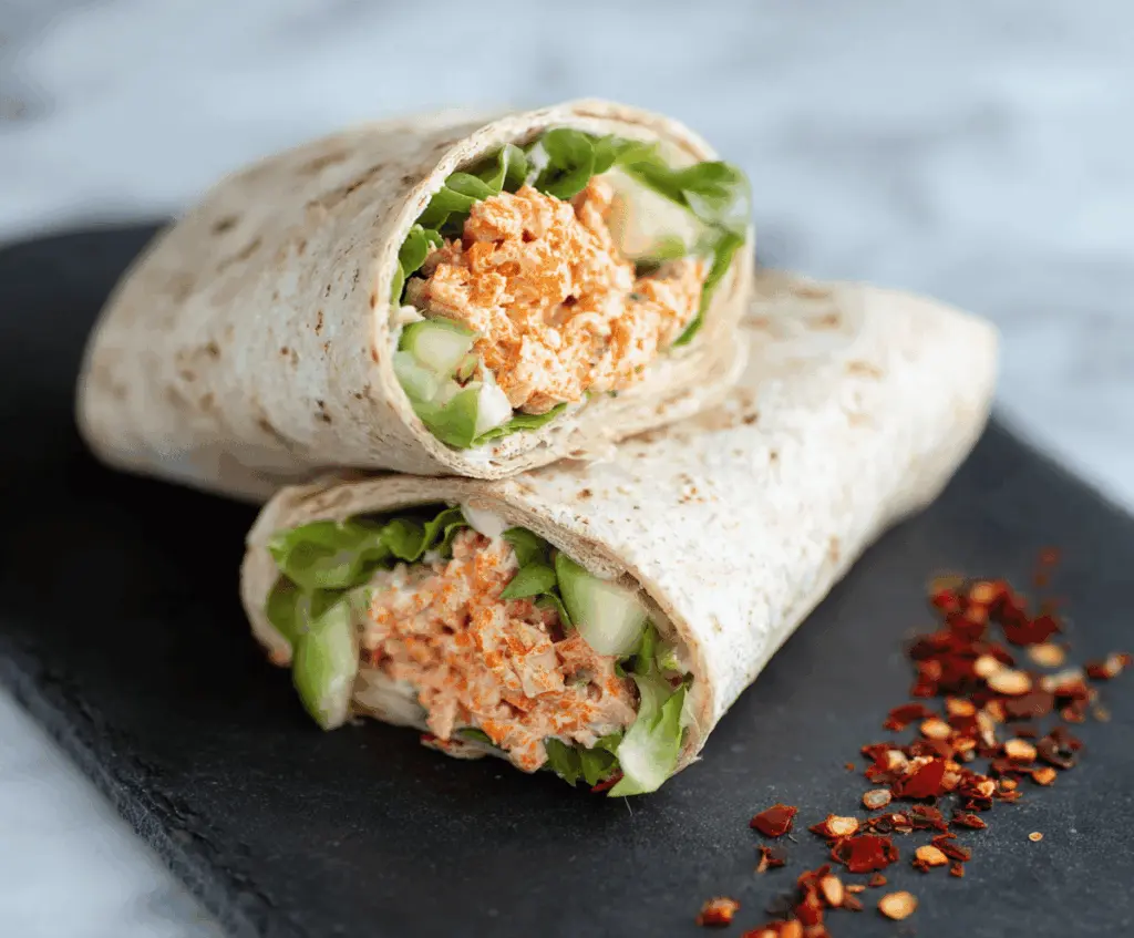 Spicy Tuna Wraps featuring fresh tuna, spicy sauce, and crisp vegetables rolled in a tortilla for a flavorful snack or meal