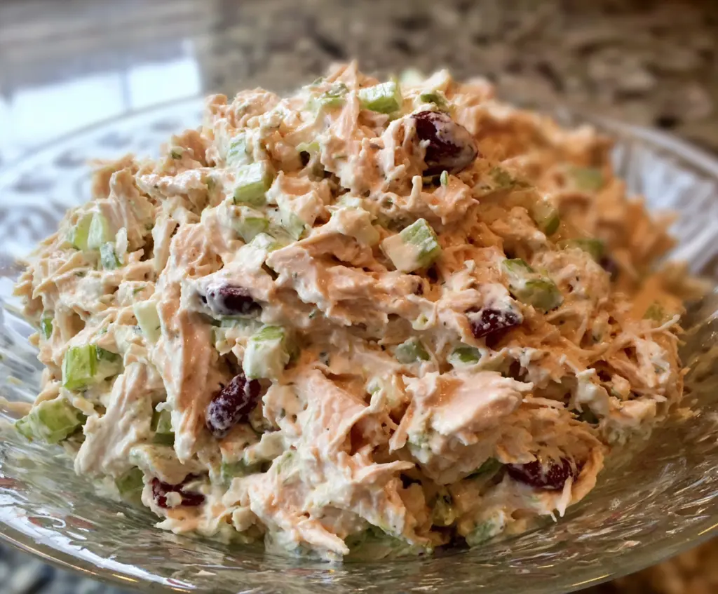 Delicious best ever chicken salad with fresh vegetables and herbs.