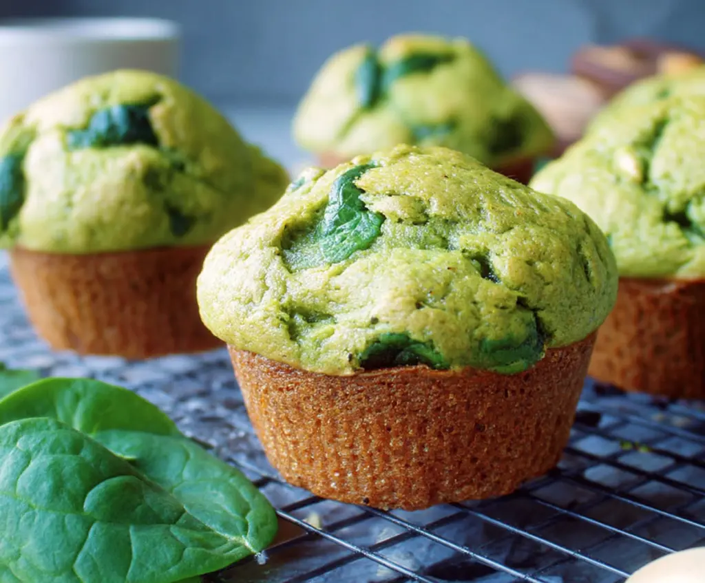 Delicious spinach and banana muffin ready to enjoy as a healthy snack or breakfast.