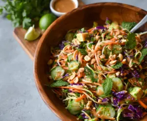 Fresh spring roll salad with crunchy vegetables and peanut dressing.