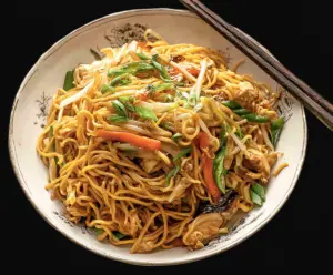 Delicious homemade Chow Mein noodles with vegetables and crispy meat